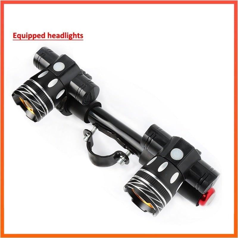USB rechargeable waterproof LED bike headlight mounted on bicycle handlebars for night cycling.