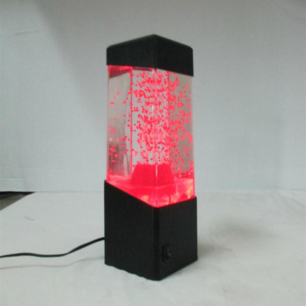 Modern black and clear LED jellyfish lava lamp creating a calming deep-sea effect