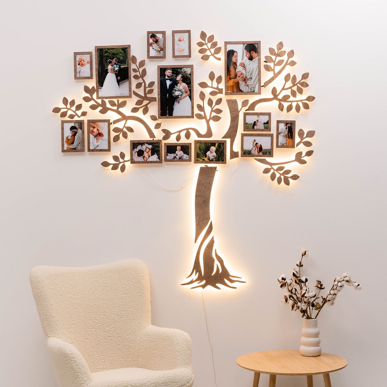Wooden LED Family Tree wall art with soft warm glowing lights on a living room wall