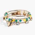 Set of three lemon-themed charm bangles featuring crystal-studded lemons and floral designs