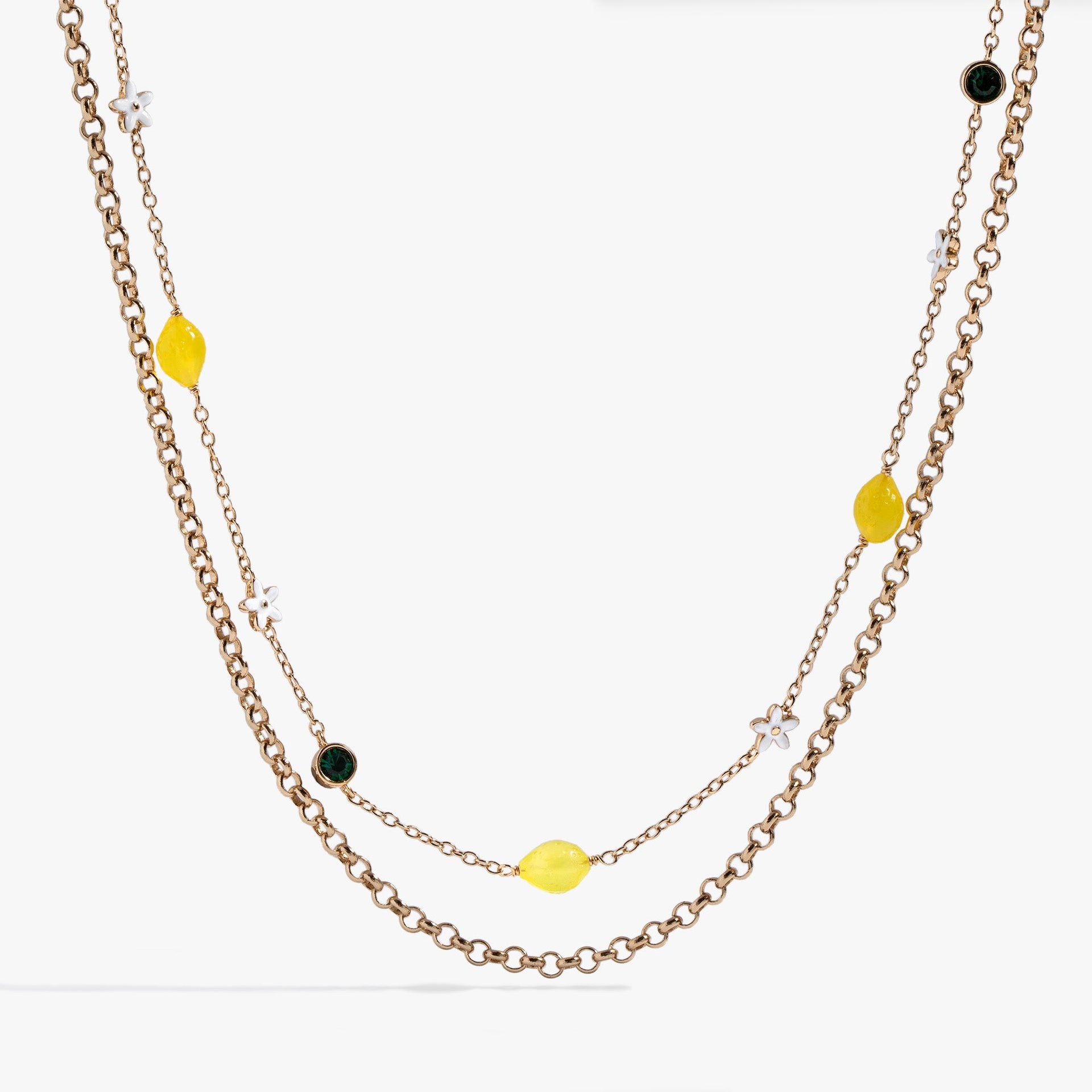 Double-layer necklace featuring lemon charms with yellow crystals and emerald green crystal accents.