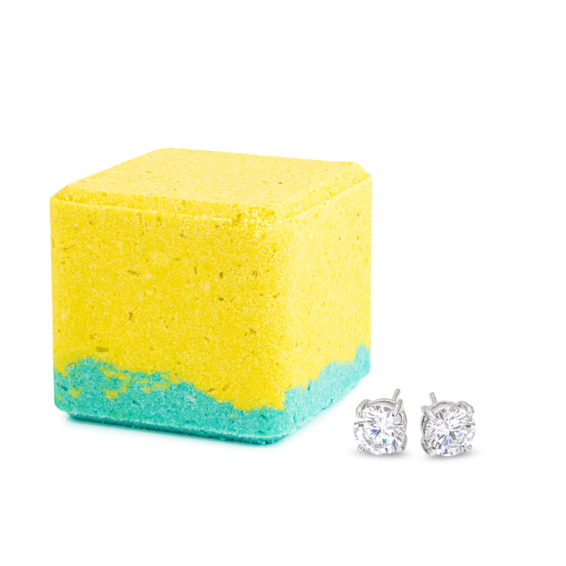 Yellow and teal Zesty Zen shower steamer cube with a pair of silver stud earrings