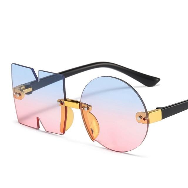 Child wearing playful, irregular rimless sunglasses shaped like the letters NO with UV protection.