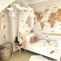 Wooden world map wall art in a modern bedroom setting showing natural wood textures