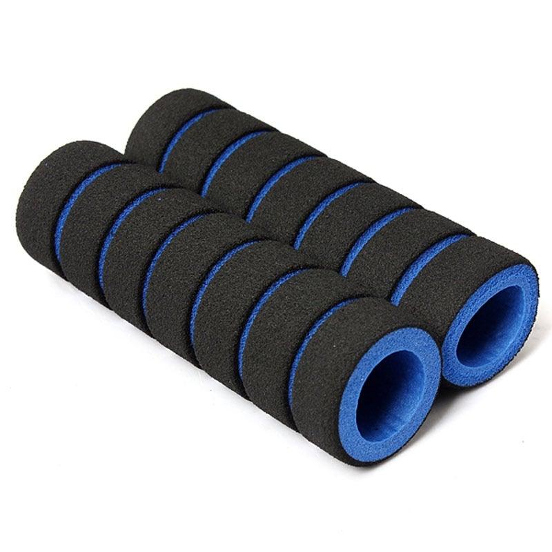 Close-up of soft black foam bicycle handlebar grips on a bike handle