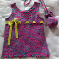Little girls mini A-line knit summer dress in pink and teal with lime green ribbon