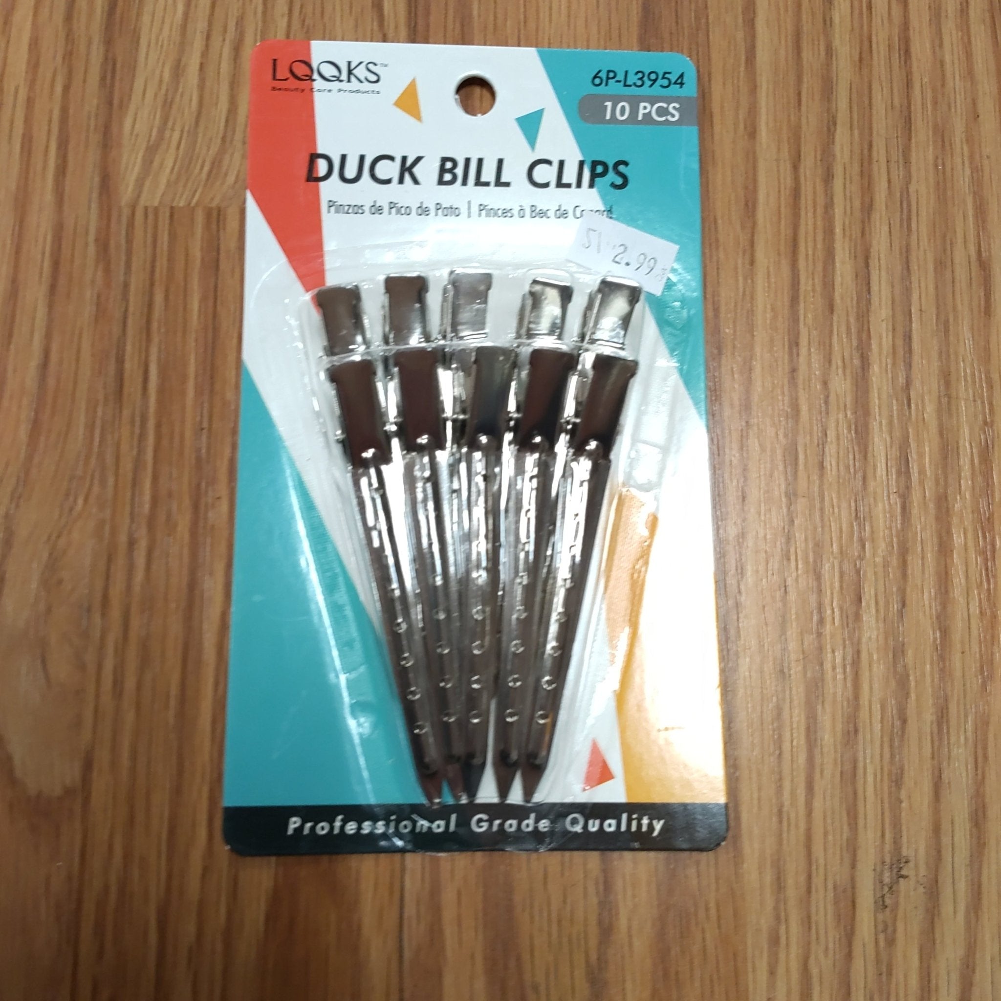 A set of 10 professional-grade duck bill hair clips for sectioning and styling.