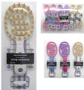 Looks Vented Flexible Shampoo Brush with ergonomic handle for scalp massage in a shower setting