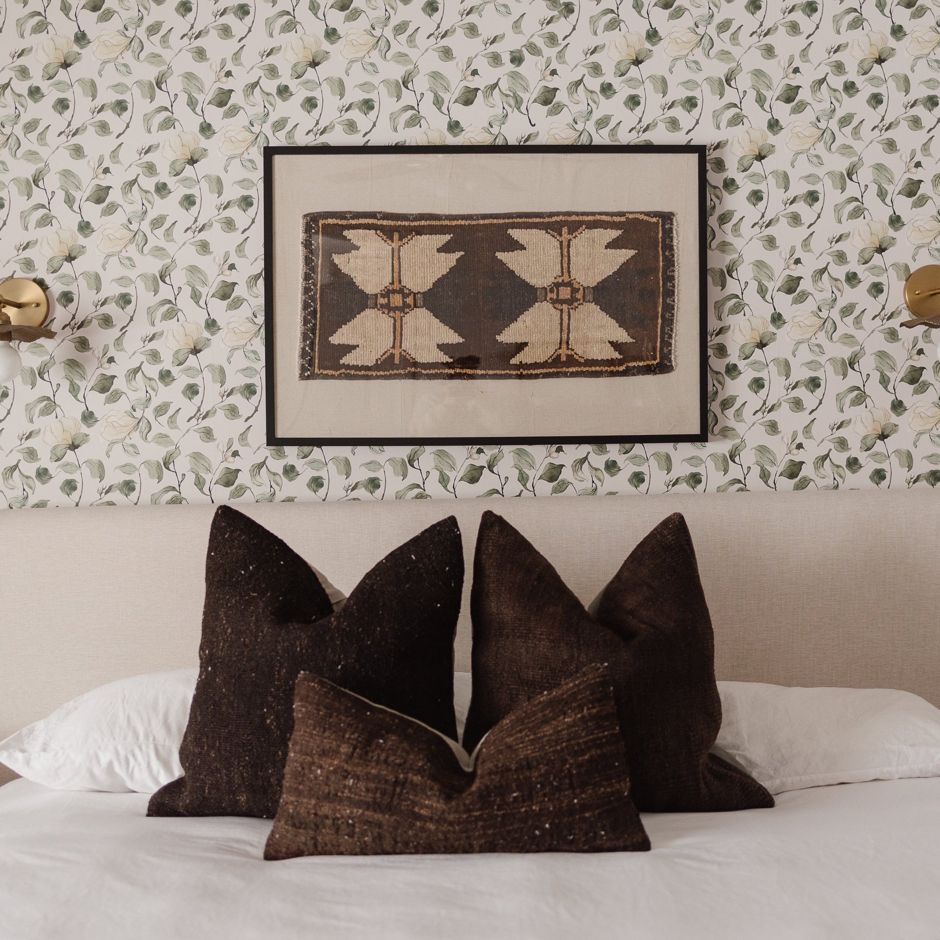 Lancaster floral wallpaper in white, green, cream, and black