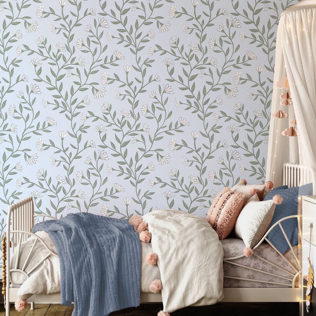 Kali wallpaper with light blue, sage green, and white floral print in a bohemian style room.