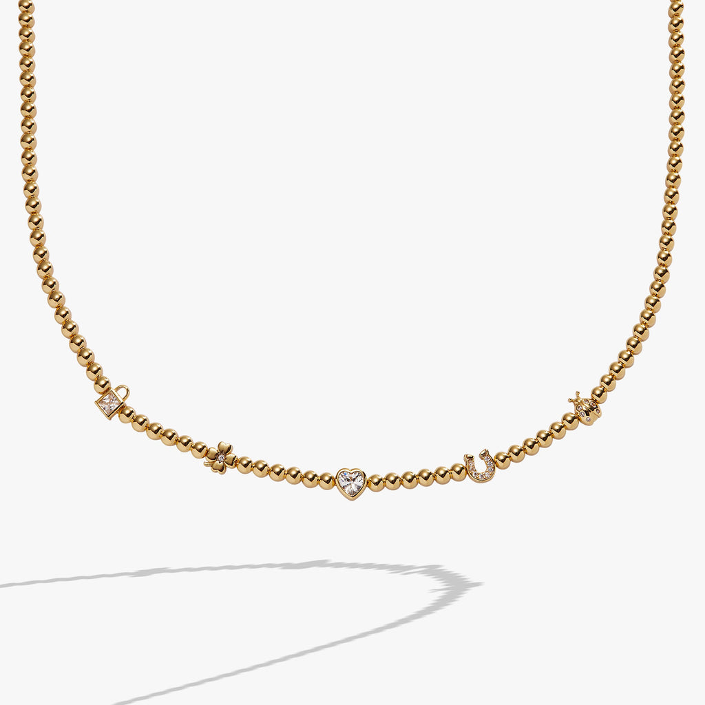 Love and Luck Charm Tennis Necklace with Crystal Heart Detail