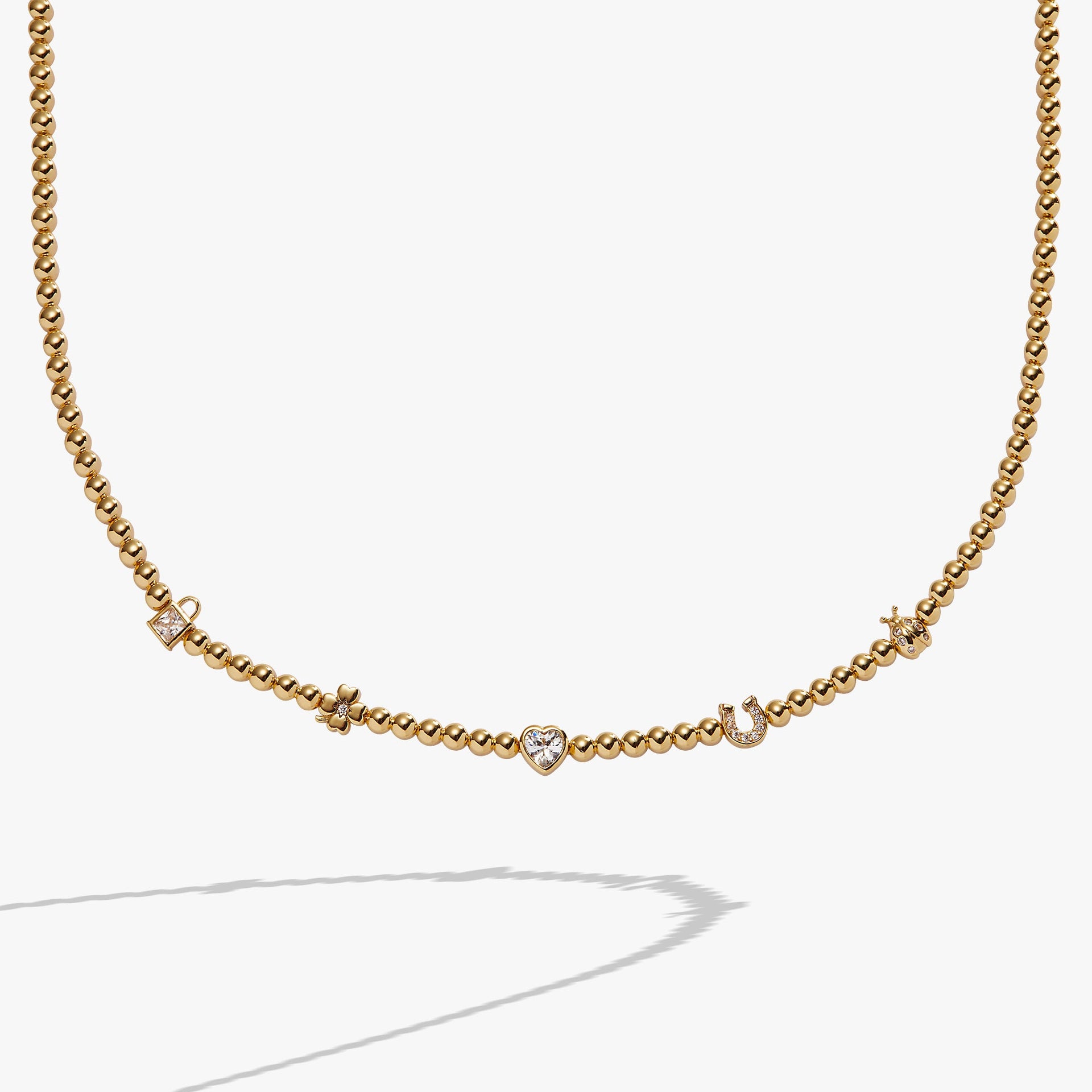 Love and Luck Charm Tennis Necklace with Crystal Heart Detail
