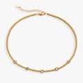 Close-up of the Love and Luck Tennis Necklace featuring symbolic charms and an adjustable beaded chain.