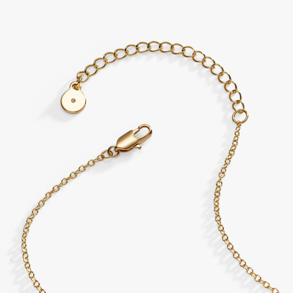 Love and Luck Pendant Necklace in Gold with Clear Crystal Charms