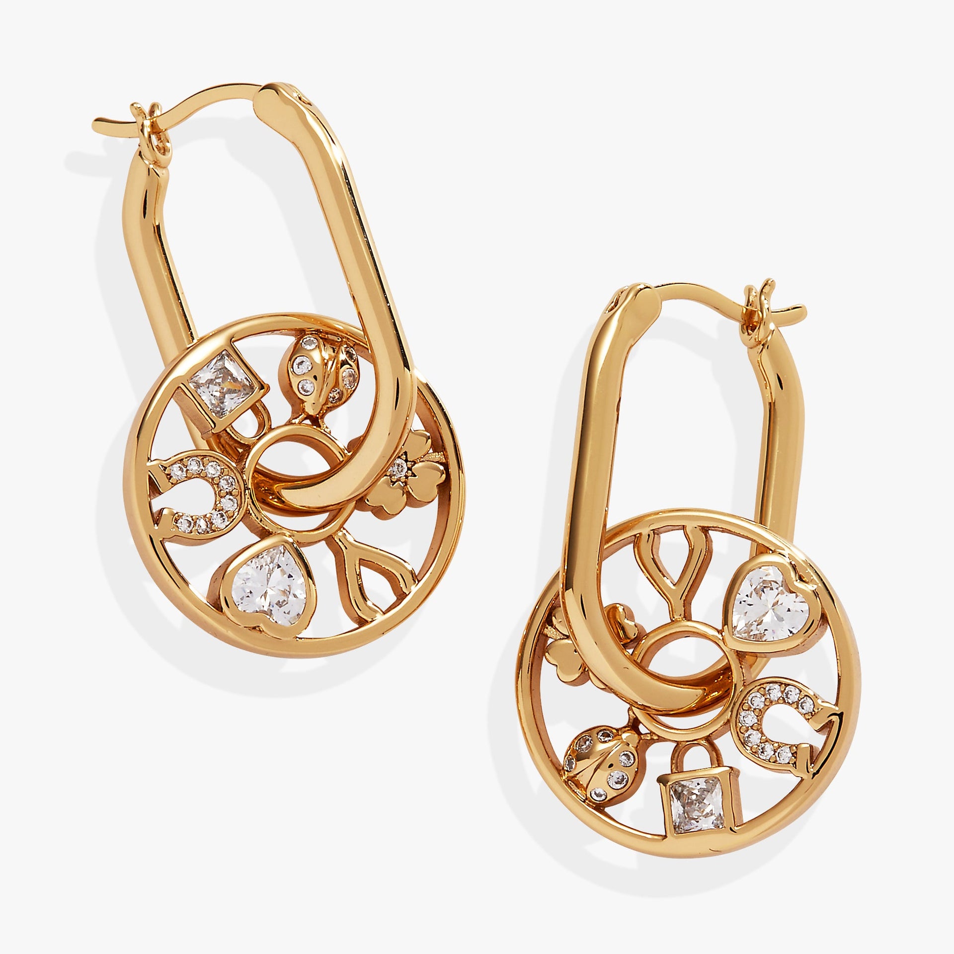 Love and Luck Wheel Hoop Earrings featuring a spinning charm with a four-leaf clover, ladybug, and crystal heart.