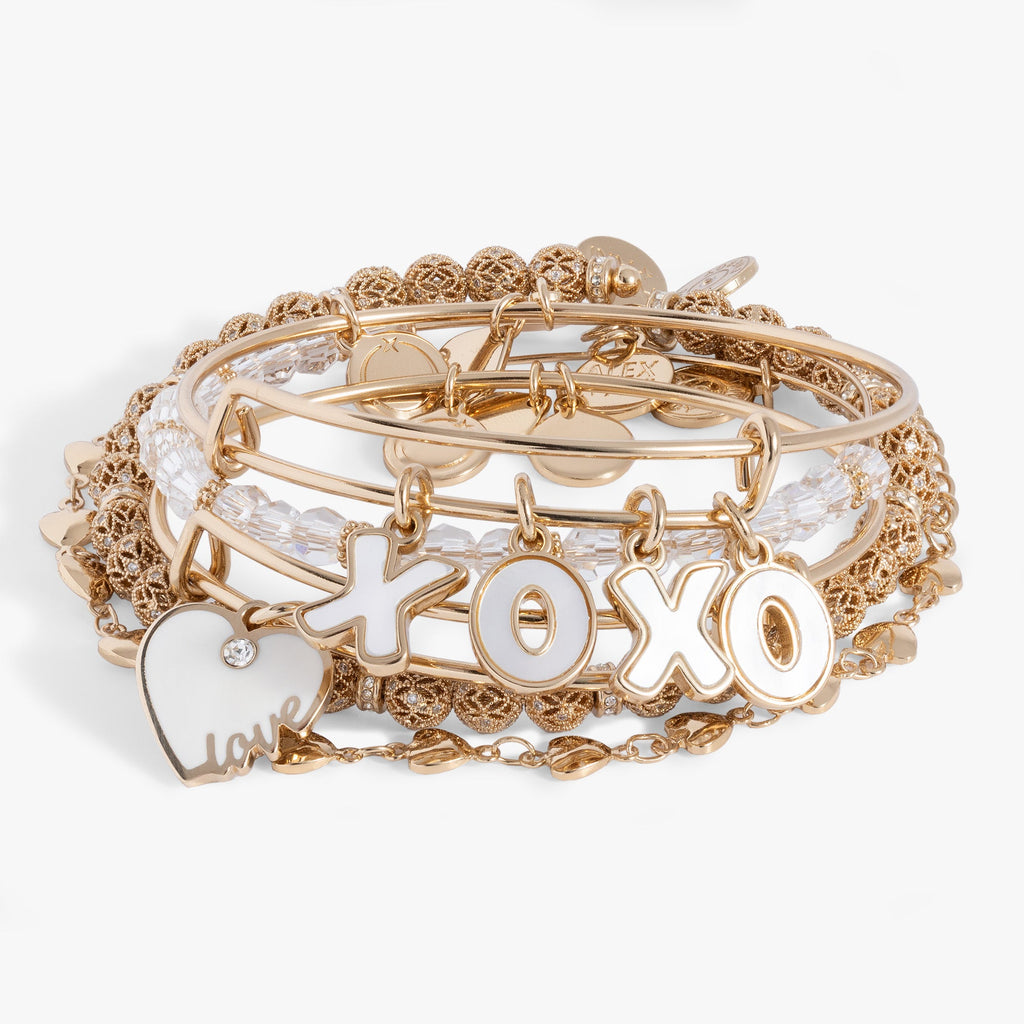 Set of 5 Alex And Ani bangles featuring Love heart charms, XOXO Mother of Pearl, and clear crystals