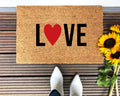 Love Heart patterned natural coir doormat for front porch entryway in brown, red, and black