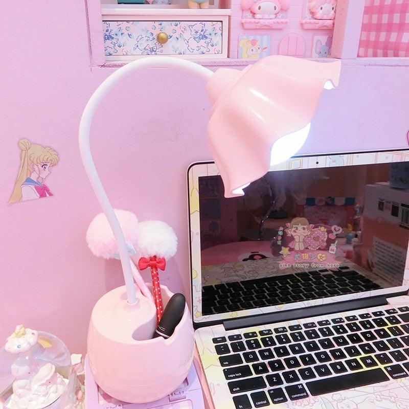 Lovely student desk lamp with pen case base and adjustable brightness settings.