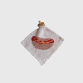 Soft knit baby lovey featuring a playful hot dog print on a cream background