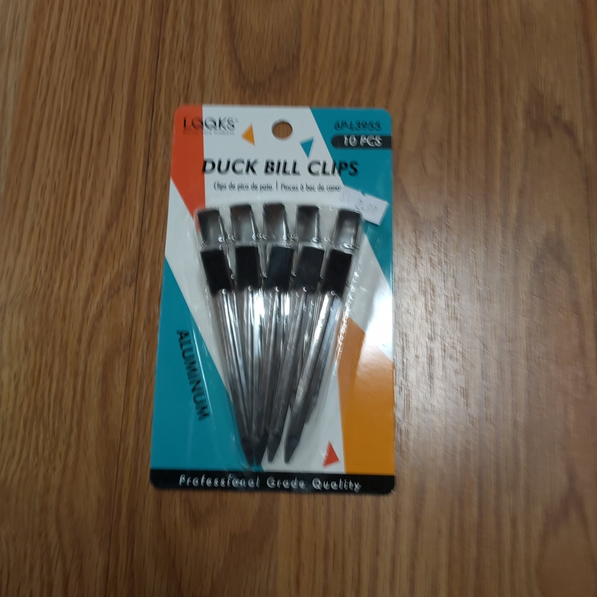 Set of 10 professional silver duck bill hair clips for styling and sectioning
