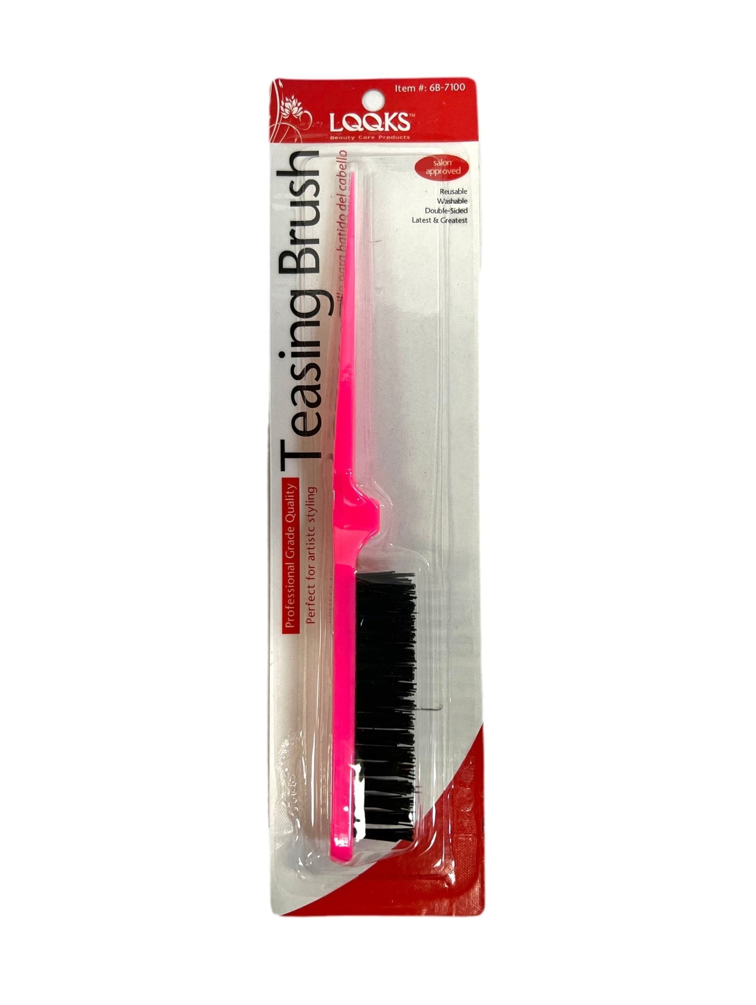 Professional hair teasing brush in pink and black for volume styling.
