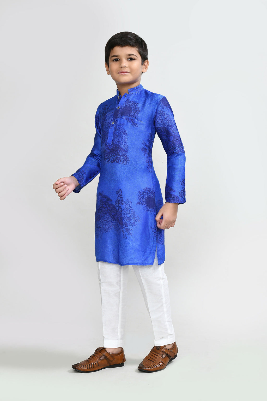 Model wearing a royal blue cotton silk kurta with matching white straight-fit pants