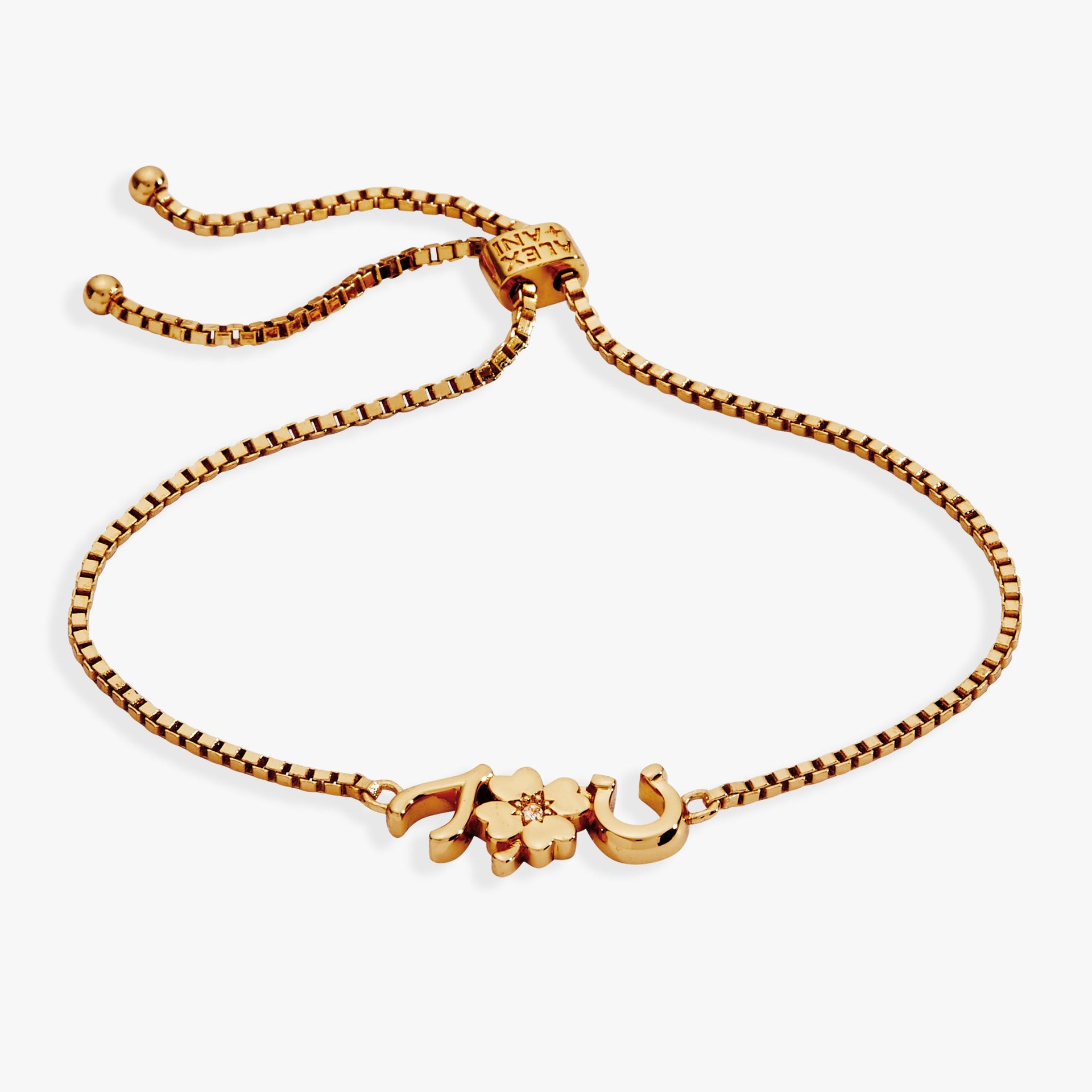Gold-plated adjustable bolo bracelet featuring wishbone, clover, and horseshoe charms