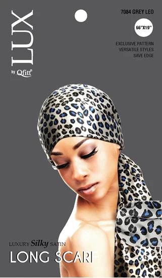 Lux by Qfitt long satin scarf with an animal print pattern in a folded presentation.
