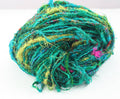 Lux Adventure recycled silk yarn in teal, green, purple, and blue hues