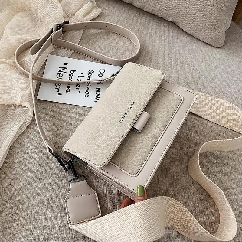 Trendy mini PU leather flap crossbody bag for women in a sleek, compact design