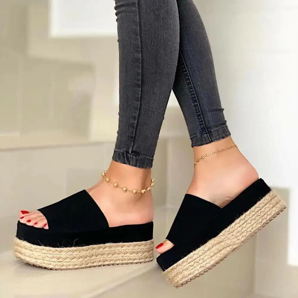 Elegant black high heel sandals with minimalist design