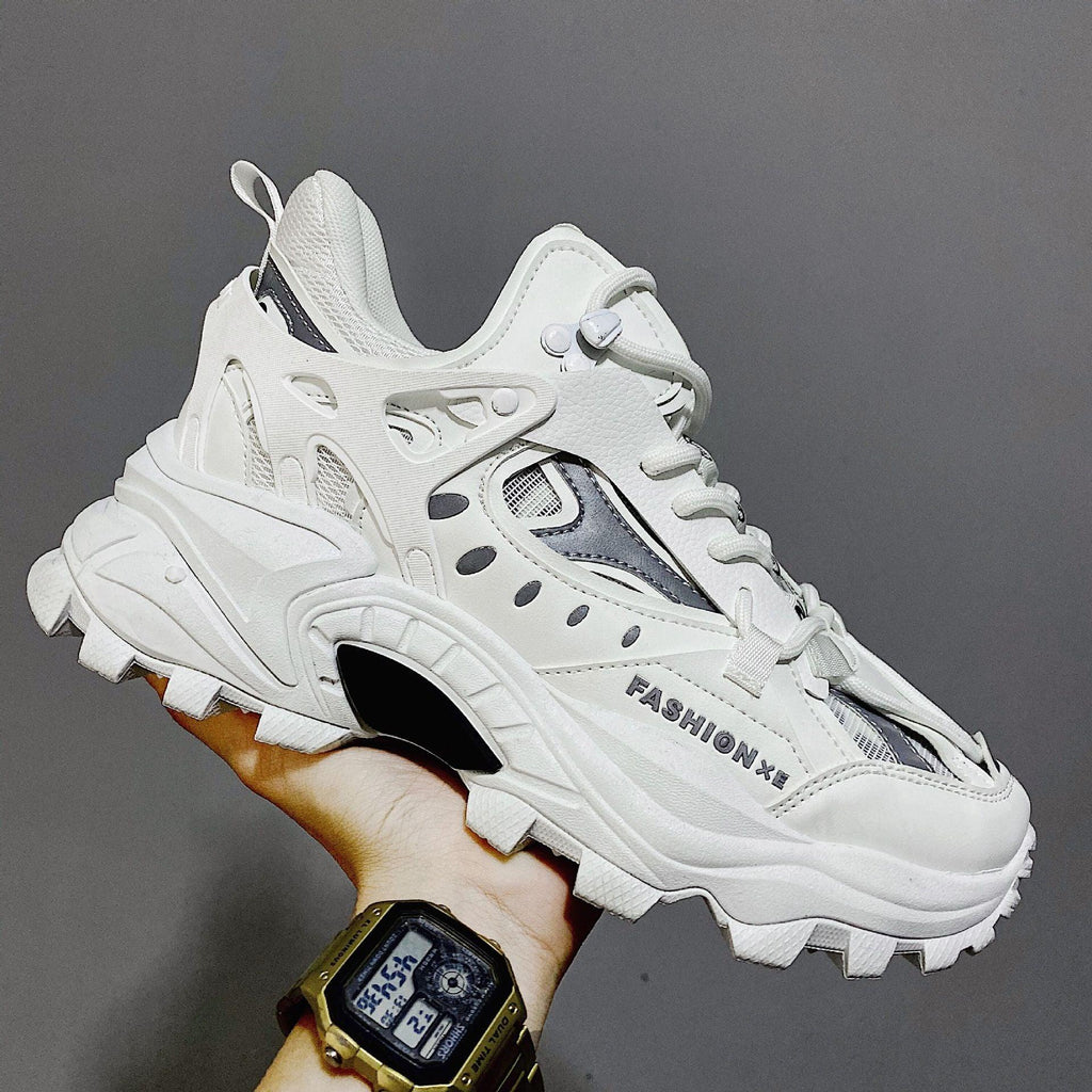 Luxury white high fashion men's sneakers with chunky rubber soles