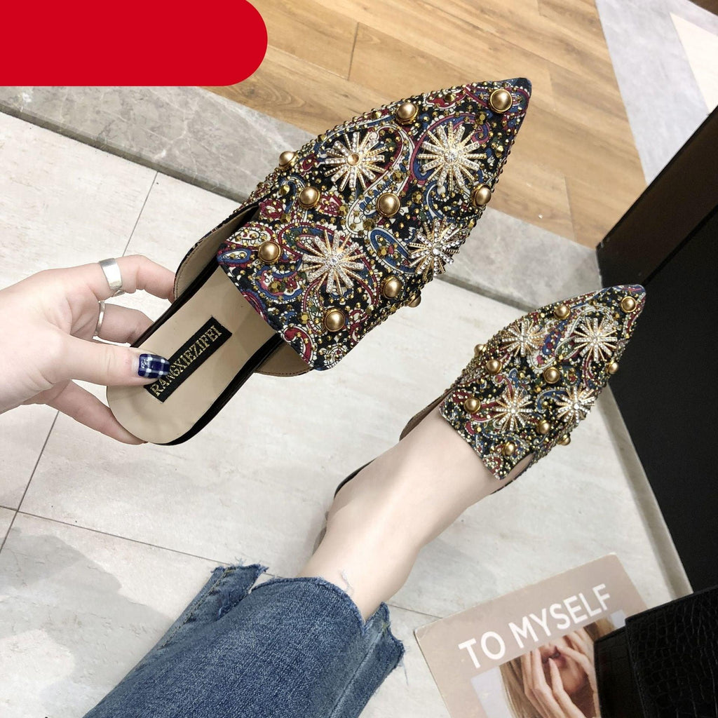 Women's chic pointed-toe low-heeled mules in a minimalist slip-on loafer style
