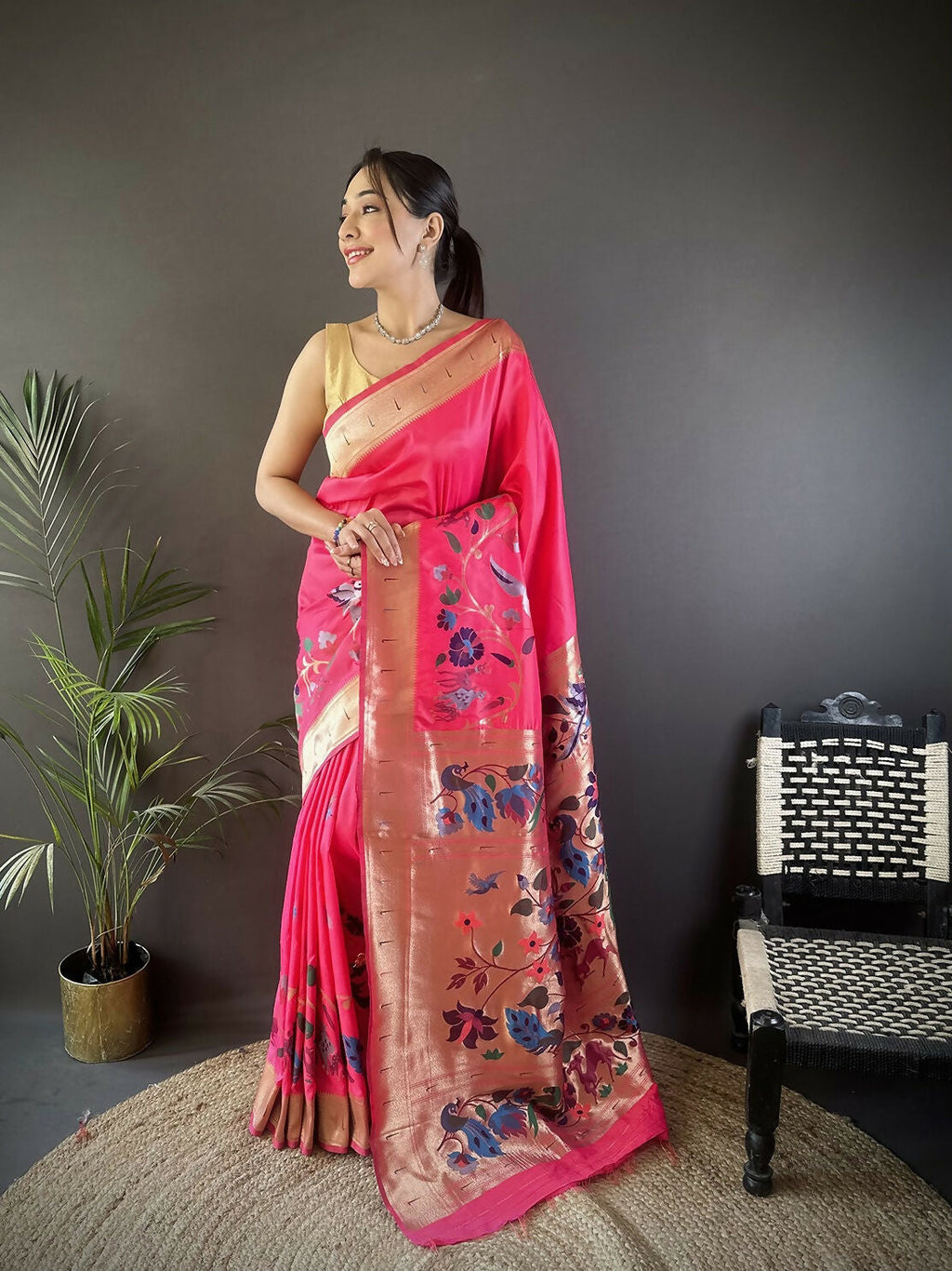 Pink Paithani Saree with floral design on soft silk fabric.