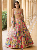 A woman wearing a multicolor faux georgette lehenga choli with heavy 5mm sequins and embroidery work.