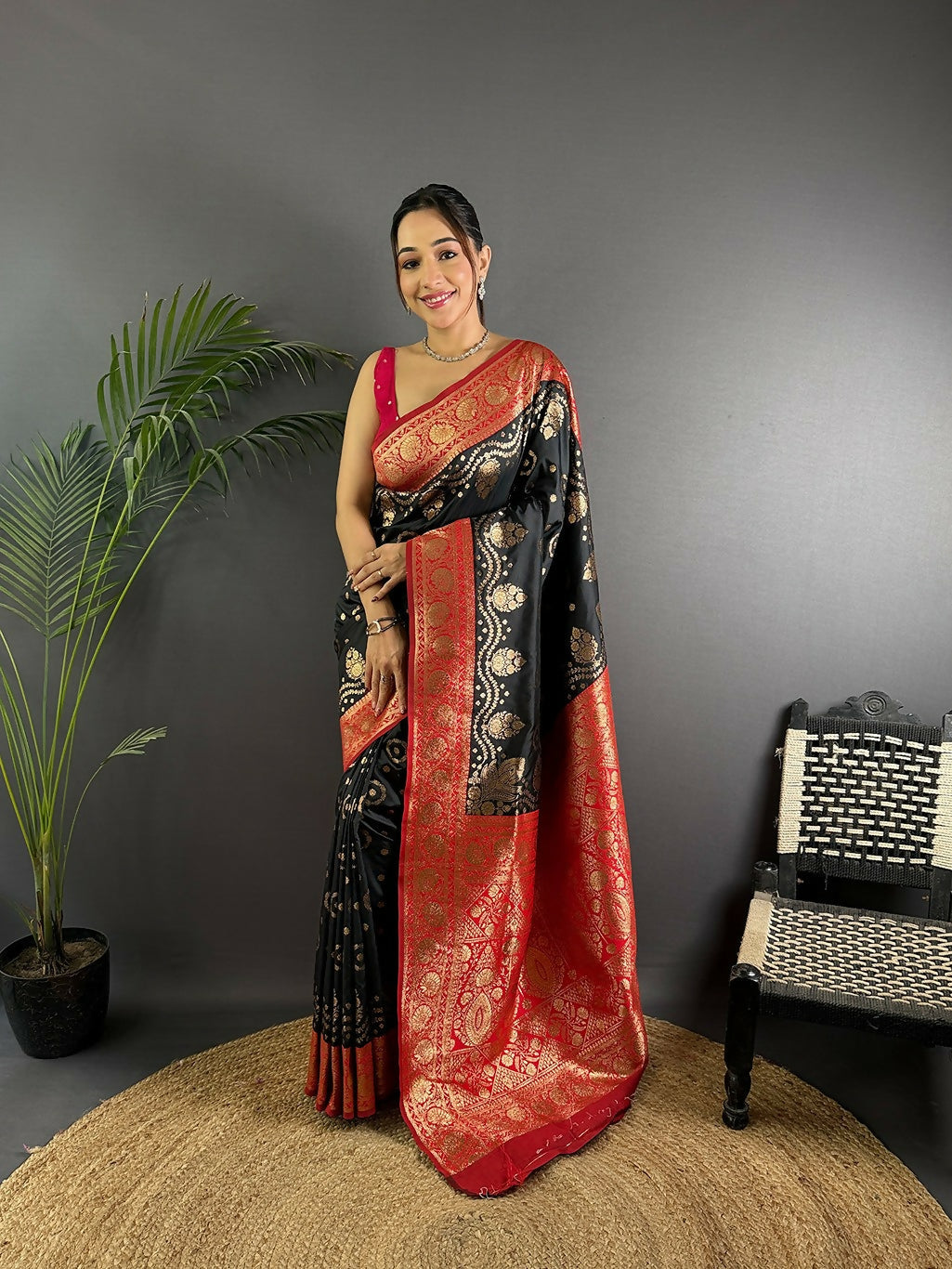 Red Banarasi silk saree with intricate butti embroidery and unstitched blouse piece