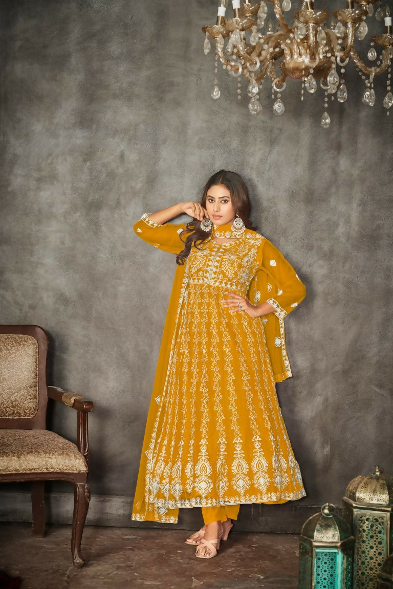 Elegant Yellow Net Anarkali Kurta set with detailed embroidery, includes dupatta and pants