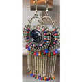 Long Afghani Chandbali earrings with multicolor beads and stone details on a clean background