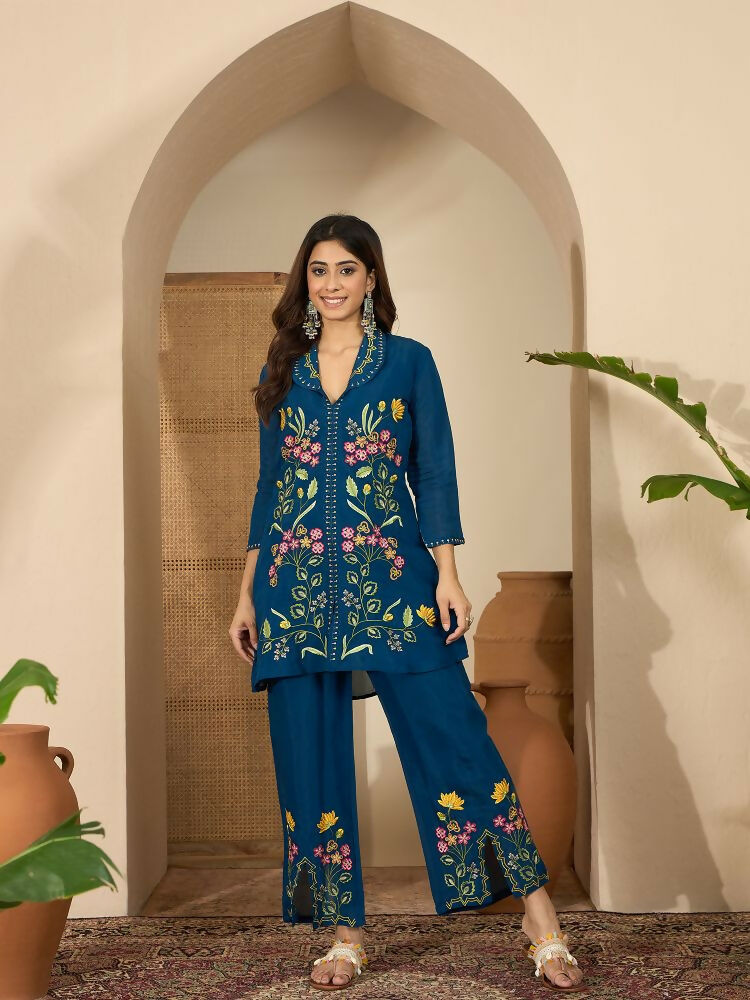 Close up of blue Roman Silk embroidered kurta with a shirt collar