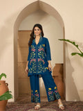 Close up of blue Roman Silk embroidered kurta with a shirt collar