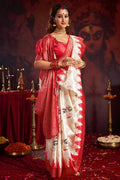 Off-white silk blend Garad saree with traditional ethnic motifs and a contrasting red blouse