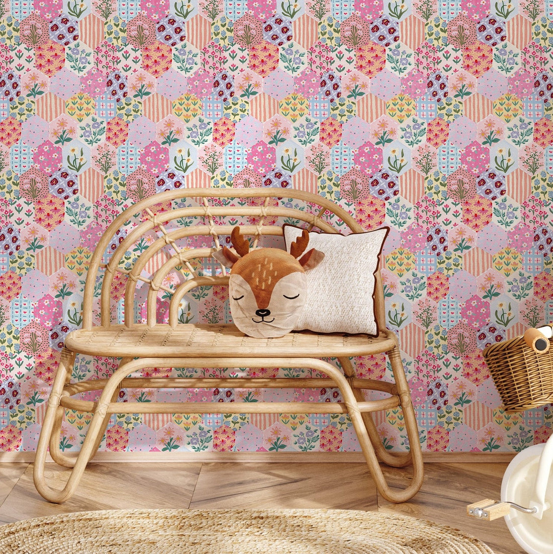 Maelia geometric wallpaper in a bright palette of pink, yellow, light-blue, and peach