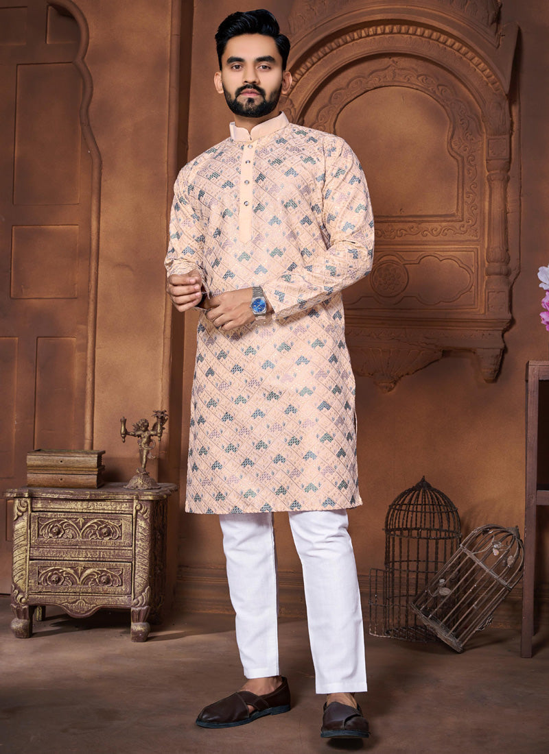 Close-up of a cream Italian silk kurta with intricate embroidery for baby boys.