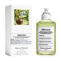 Maison Margiela Replica From The Garden Eau de Toilette bottle with pale green liquid in apothecary style