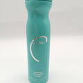 Teal bottle of Malibu C Swimmers Wellness Shine Enhancing Shampoo