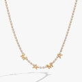 Close up of the Mama Crystal Tennis Necklace on a white background, highlighting crystal chain and MAMA lettering.