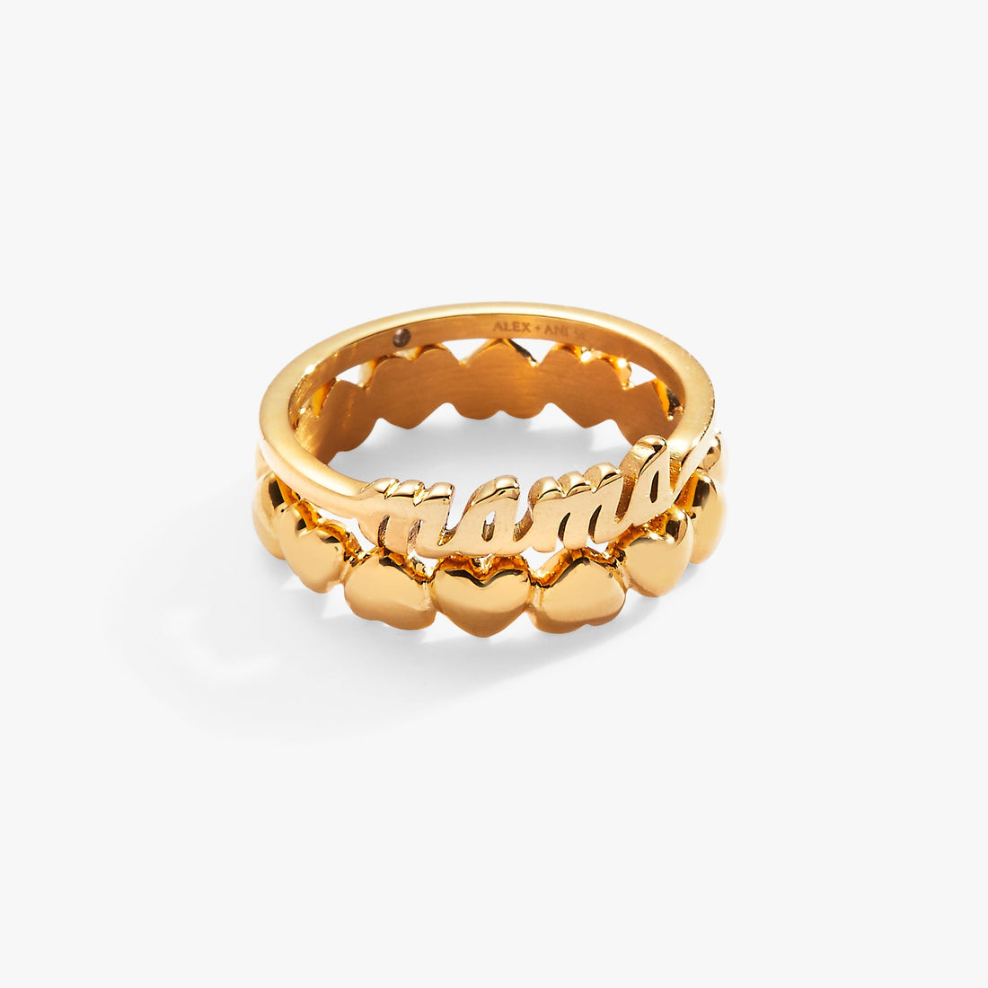 A two-piece stackable gold ring set featuring a script Mama ring and an alternating heart pattern band on a white background.