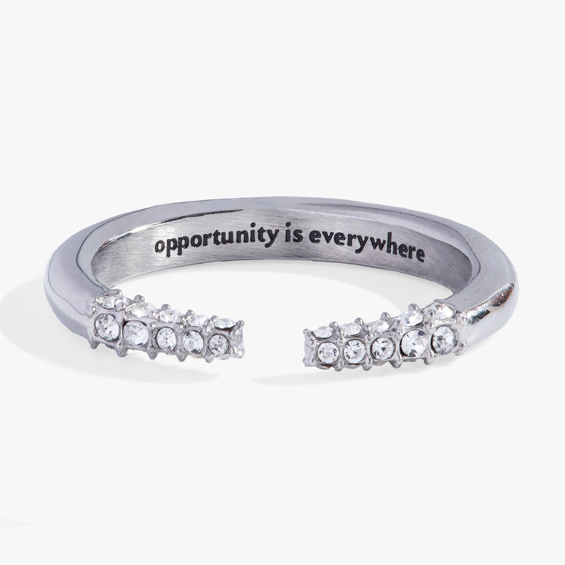 Silver-tone stainless steel open ring with tusk-shaped ends and crystal accents