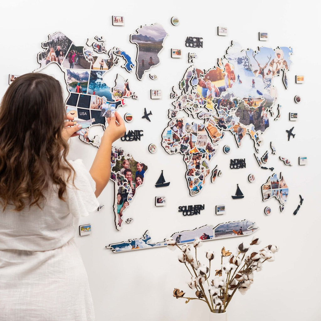 World Photo Map Midnight featuring a dark sleek design with displayed travel photos on a wall