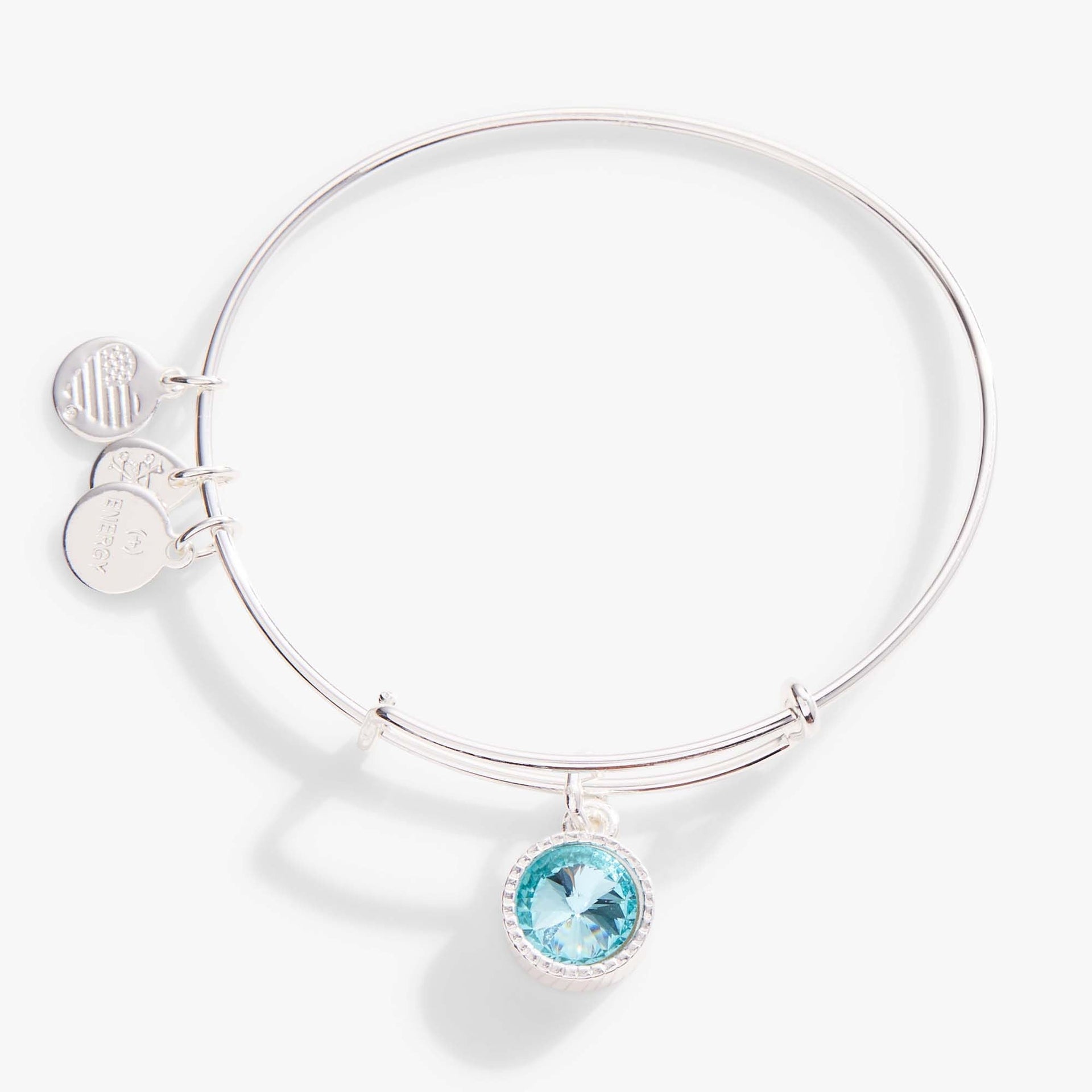 March birthstone charm bangle featuring an aquamarine crystal charm in a polished metallic finish.